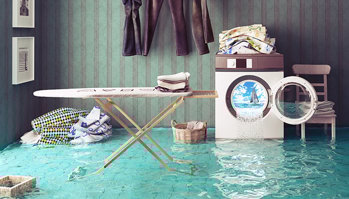 Flooded laundry room in the basement