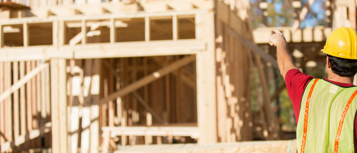 Construction working building a house in Saskatchewan