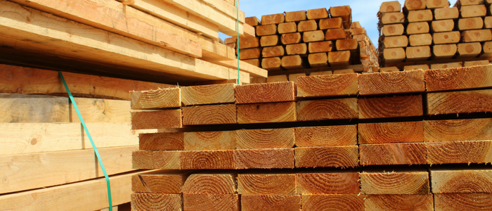 Close up of stacks of lumber on construction site