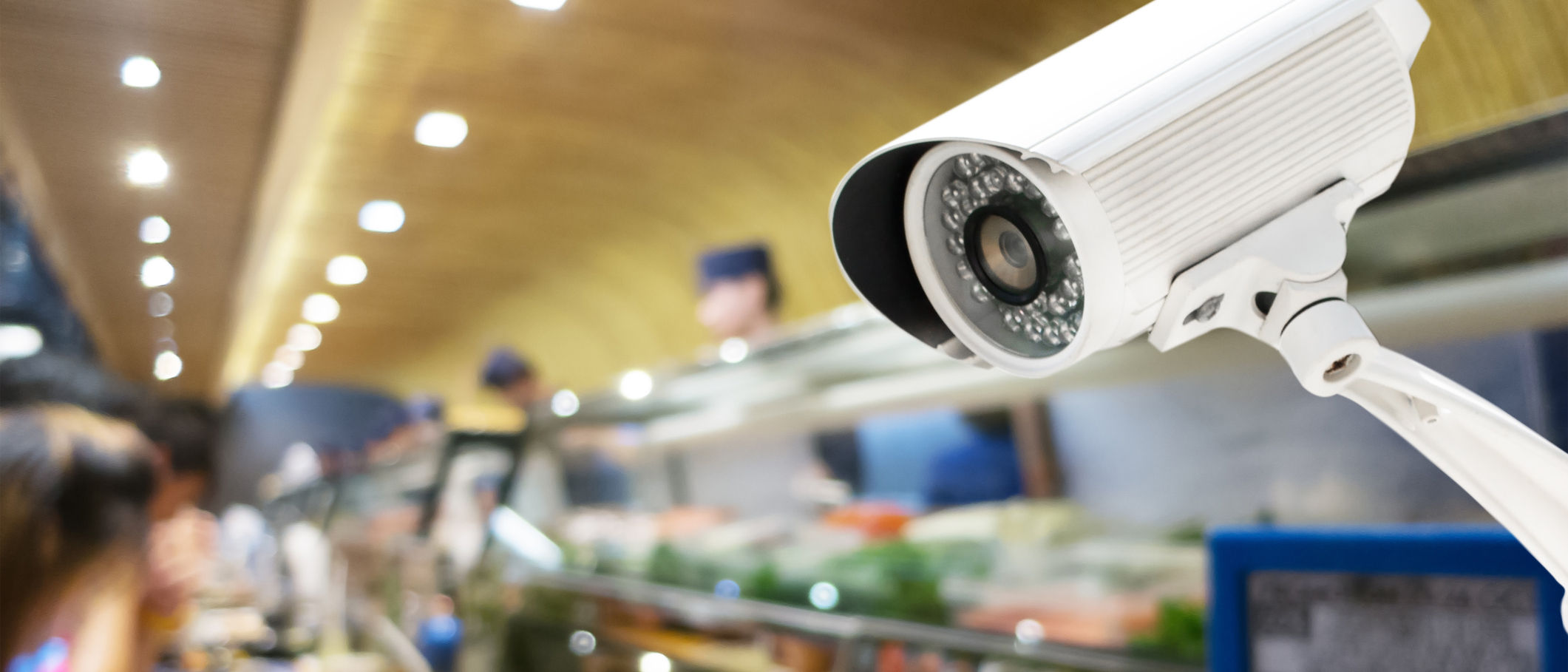 An alarm system with a CCTV surveilling the premises of a restaurant