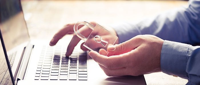 Someone typing on a computer