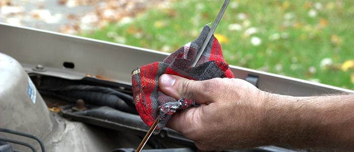 An oil-soaked cloth being used.