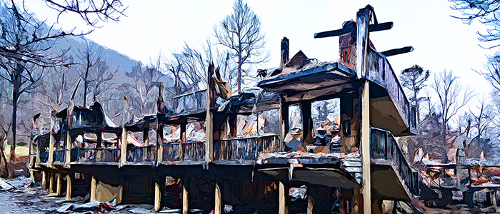 A burned motel after a forest fire